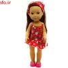 عروسک زیبا با سارافون قرمز گلدار از نمای روبرو