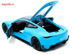 نمای پشتی تسلا رودستر آبی سبز فلزی